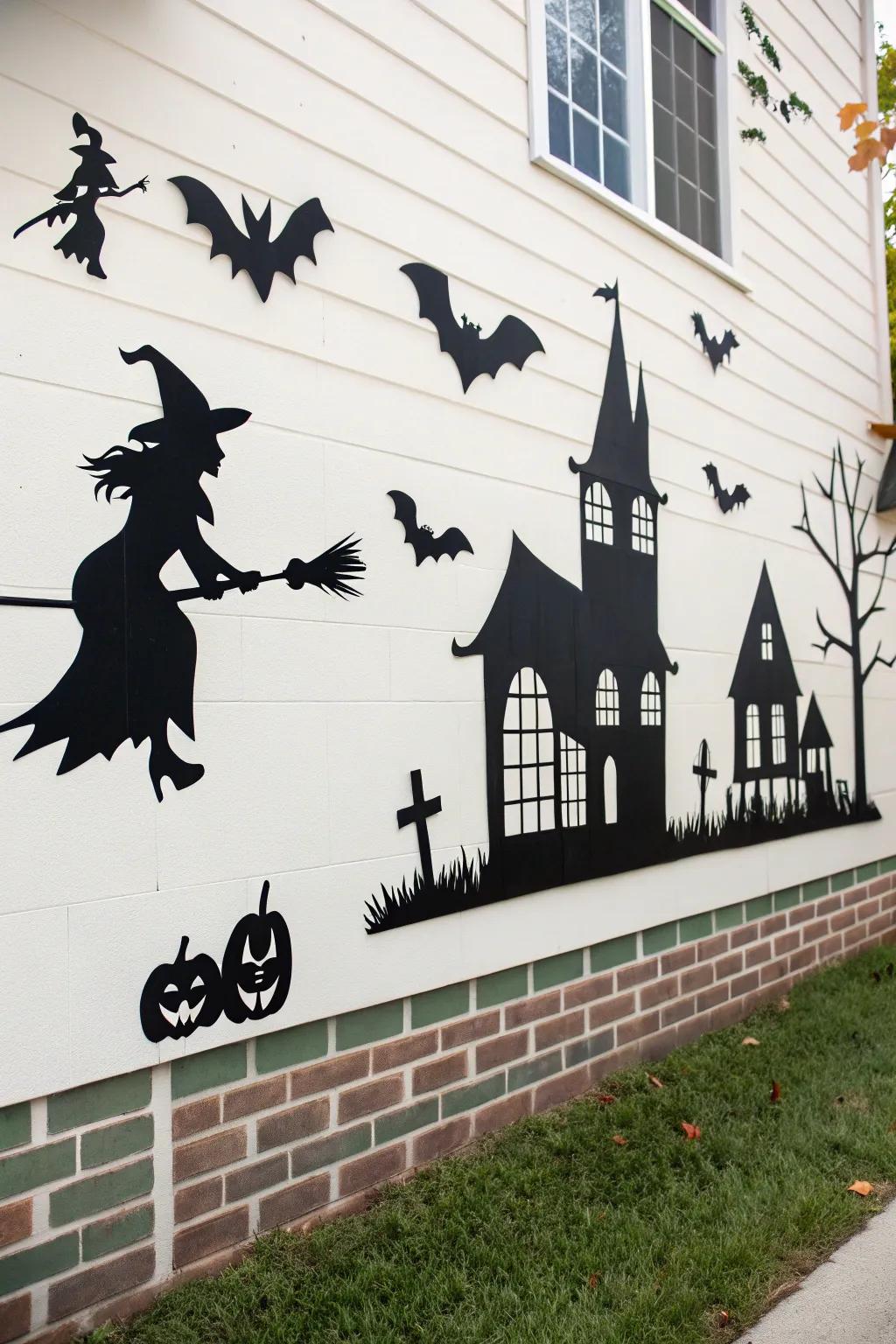 Black silhouettes make for striking Halloween wall decor.