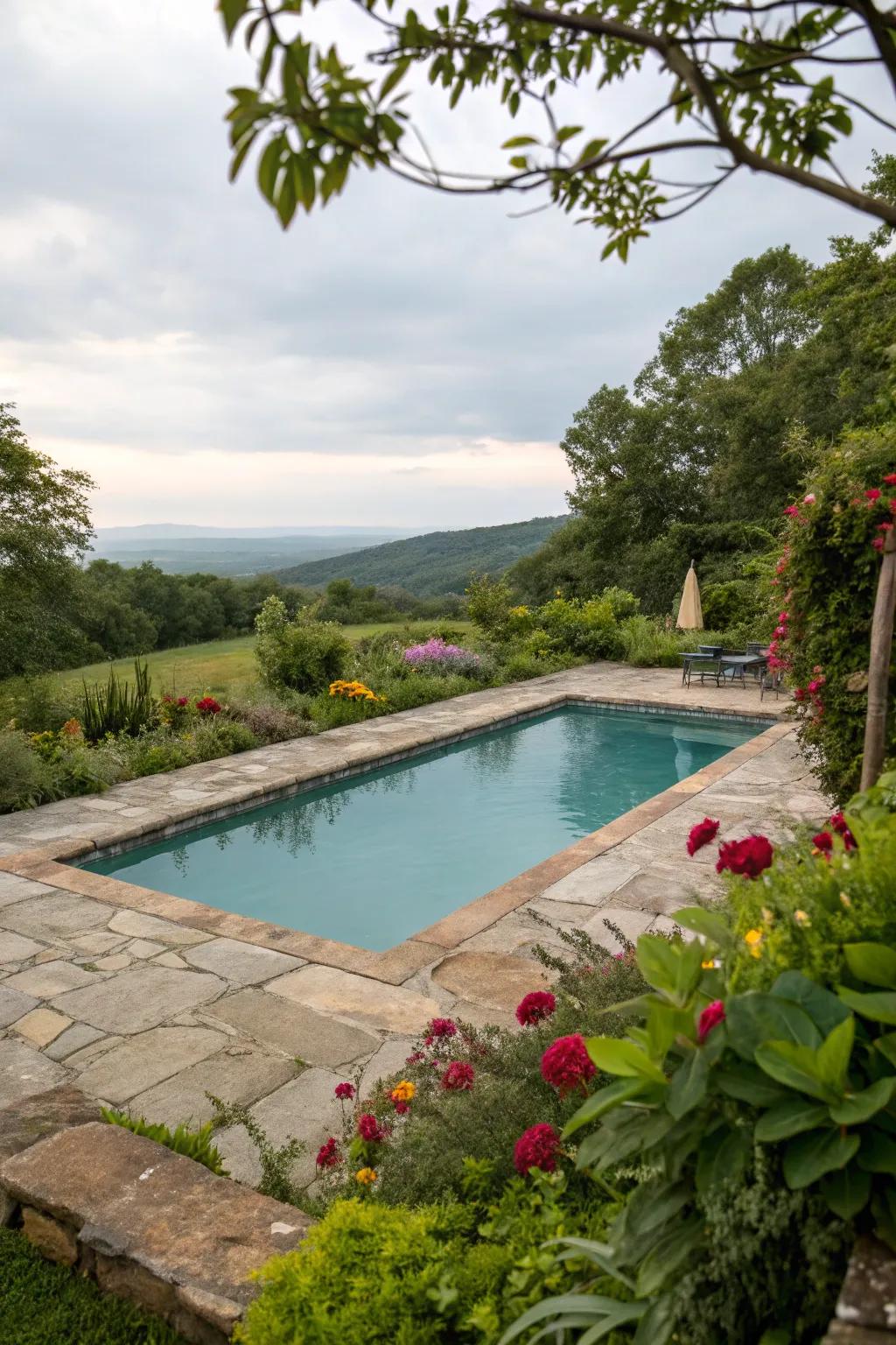 Natural stone decking beautifully complements the rectangular pool.