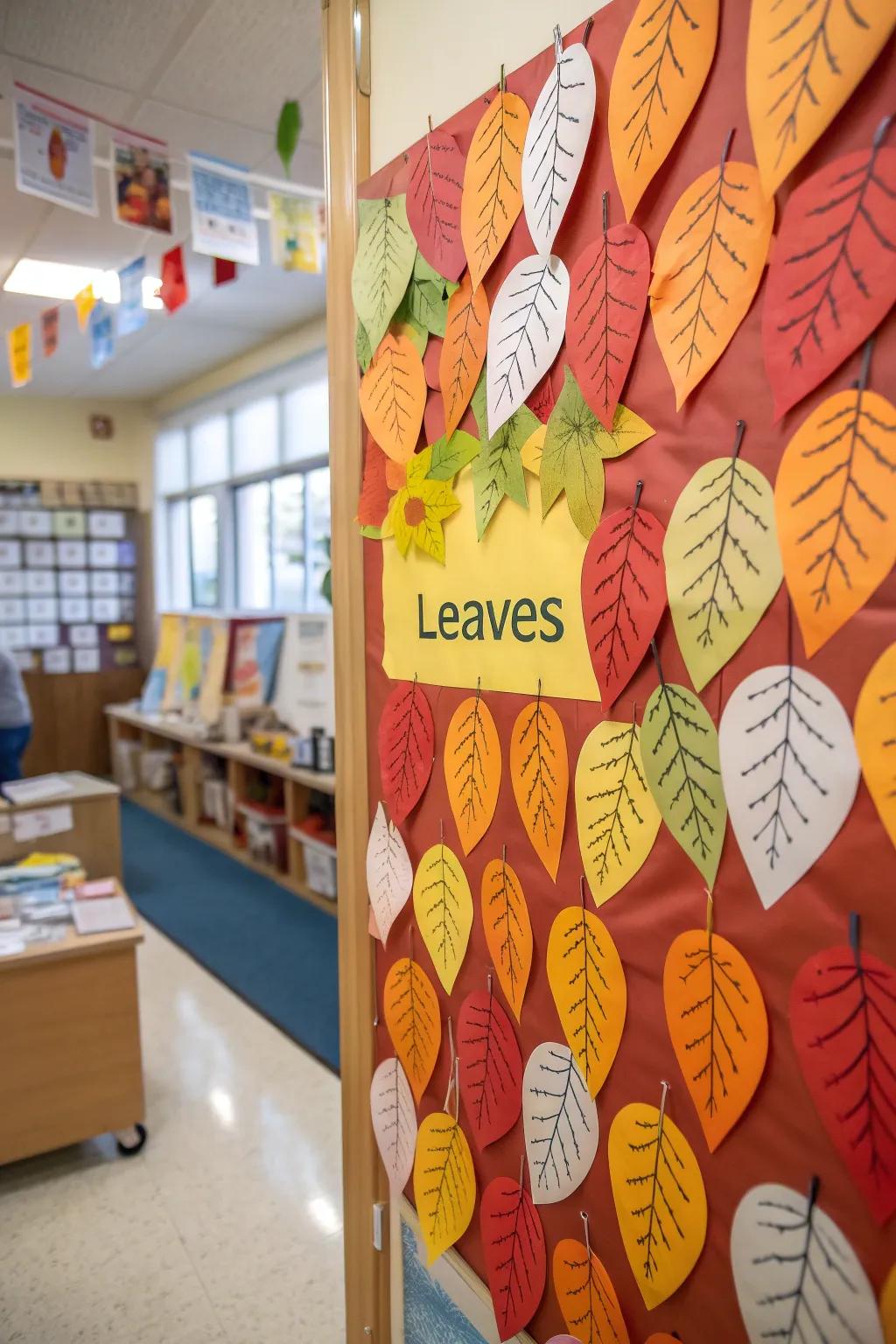 A preschool bulletin board with paper leaves featuring children's names.