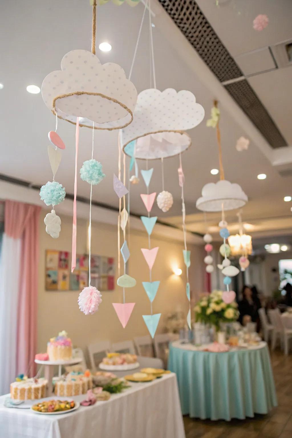 DIY cloud mobiles bring a handmade, whimsical touch to the baby shower decor.