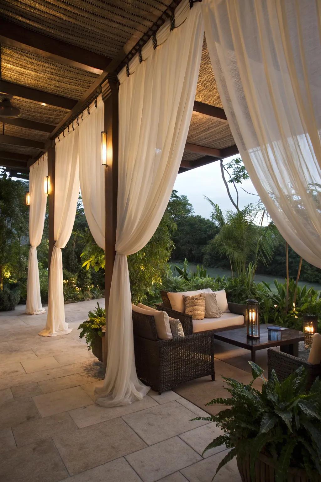 Elegant drapes creating a cozy and private patio space.