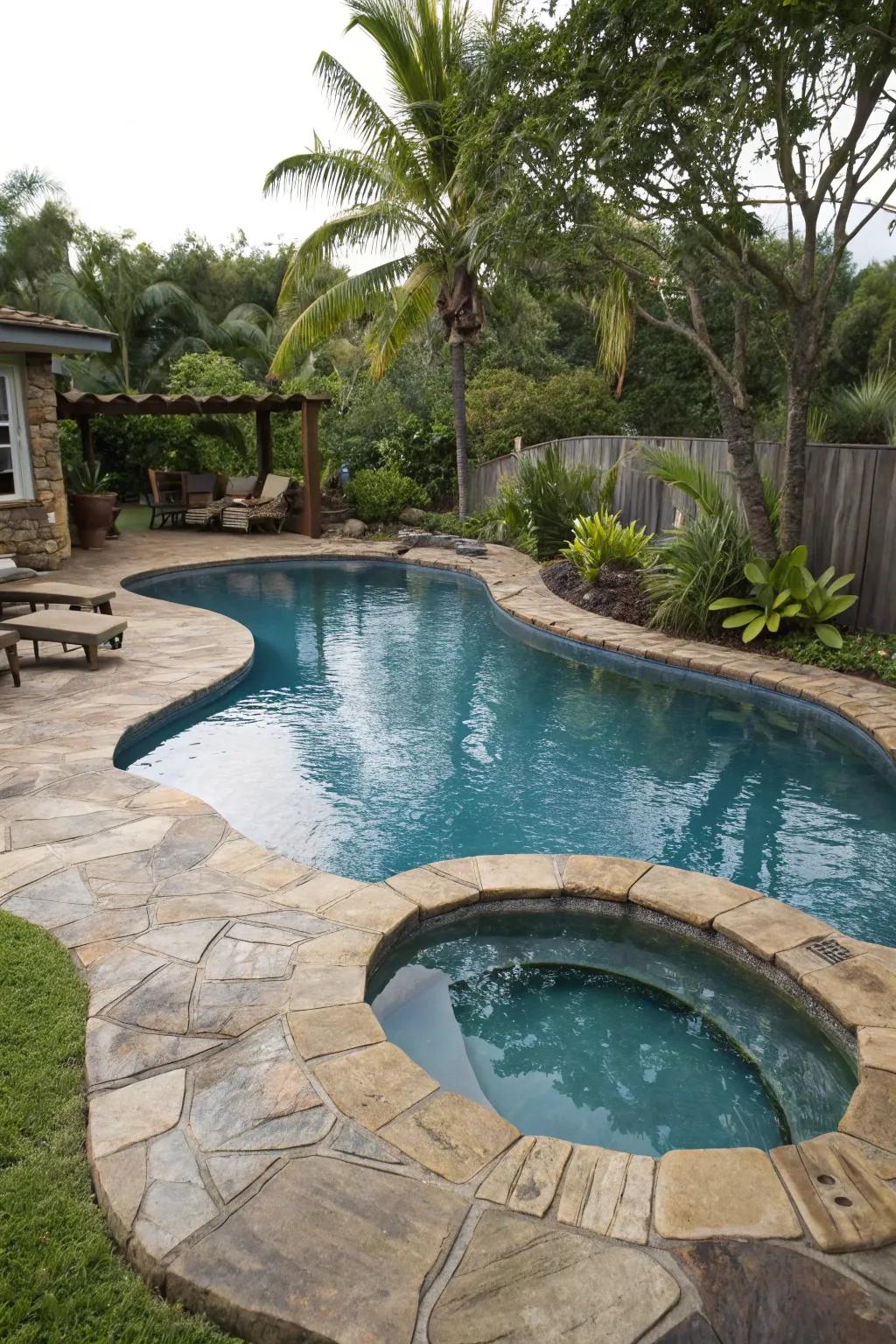 A uniquely shaped pool adding character to a backyard.