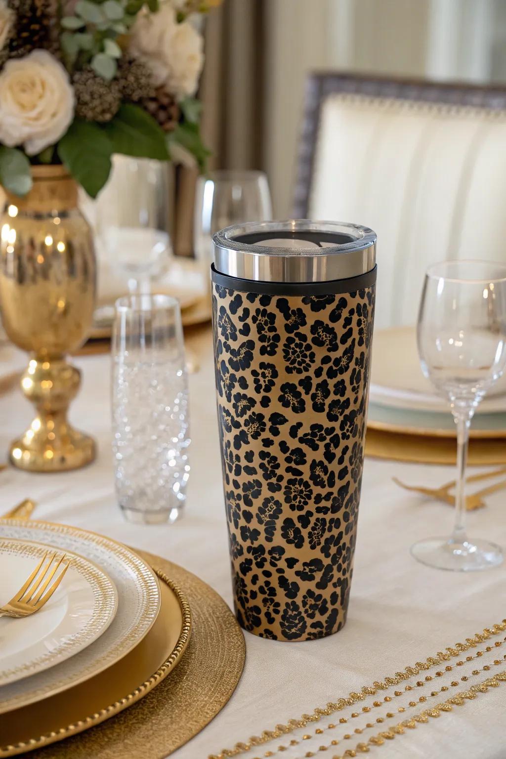 Effortlessly classy black and gold leopard print tumbler for sophisticated gatherings.