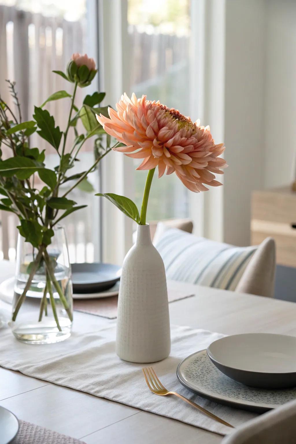 A minimalist centerpiece with a single flower.