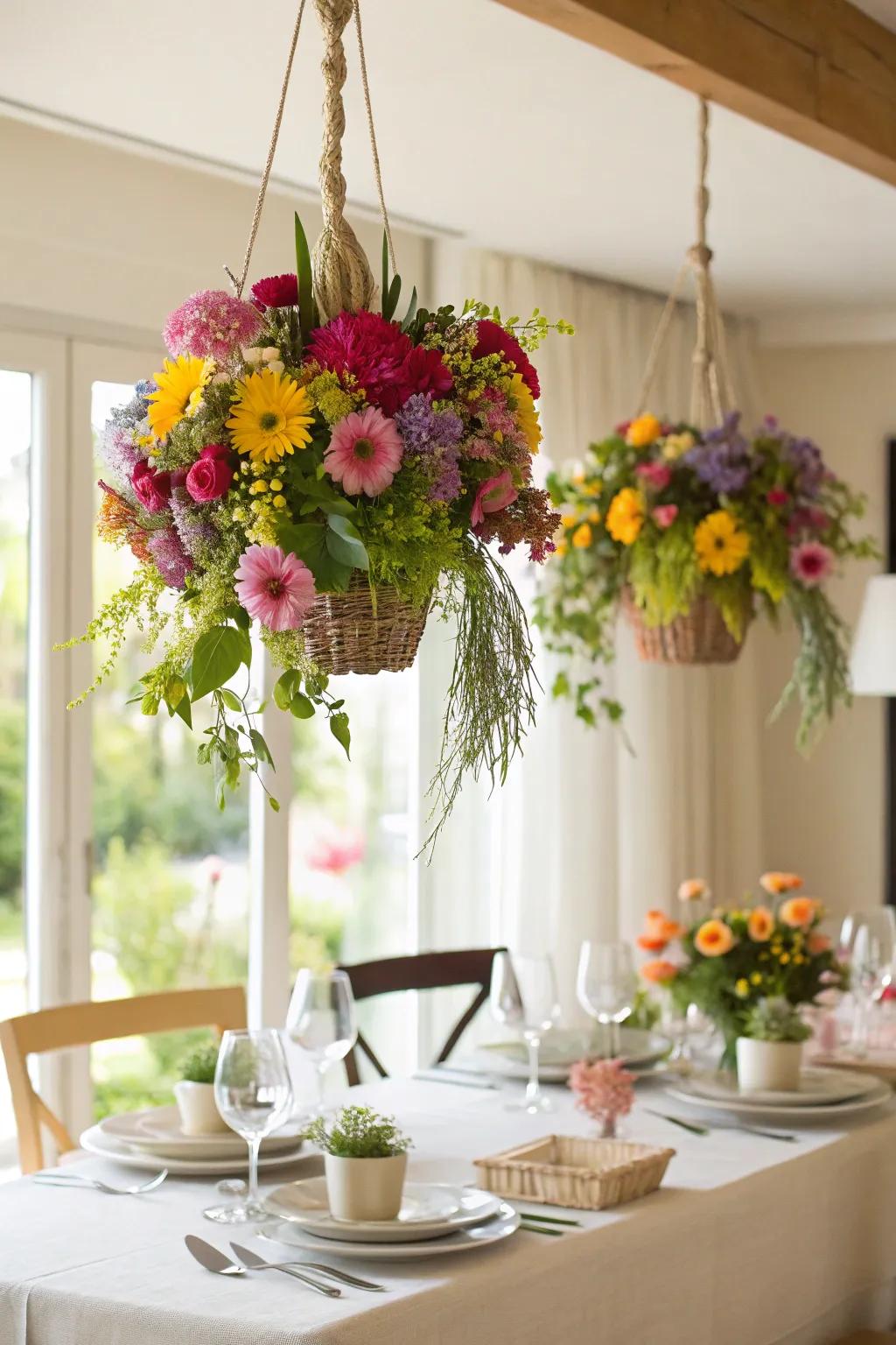 An ethereal centerpiece with whimsical hanging flower arrangements.