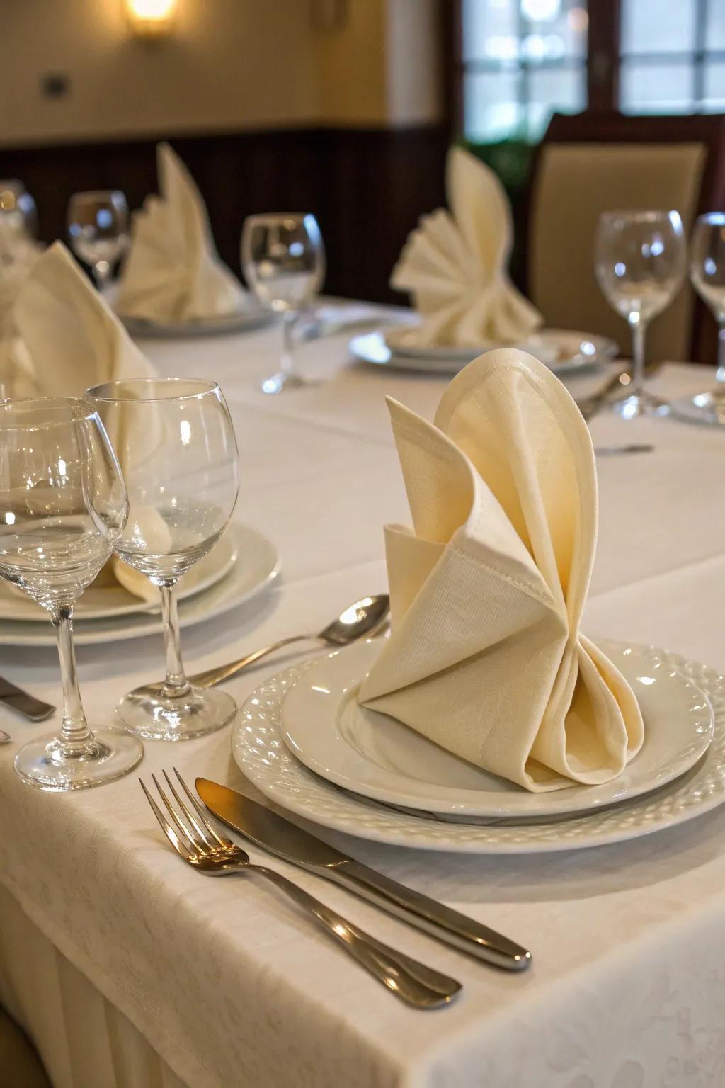 Innovative napkin folds add a touch of style to each place setting.