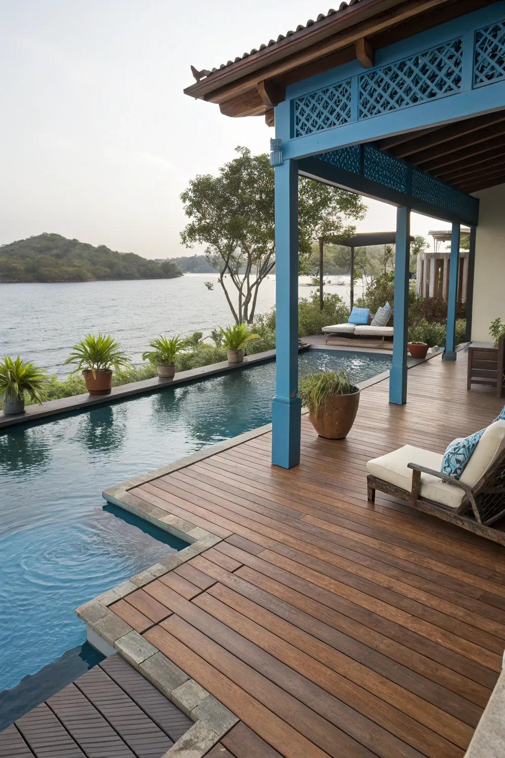 Teak and ocean blue create a tranquil seaside deck retreat.