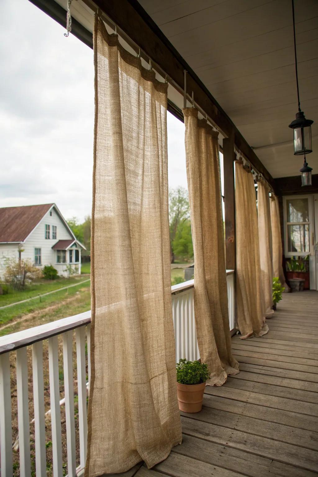 Burlap curtains add rustic elegance and privacy.