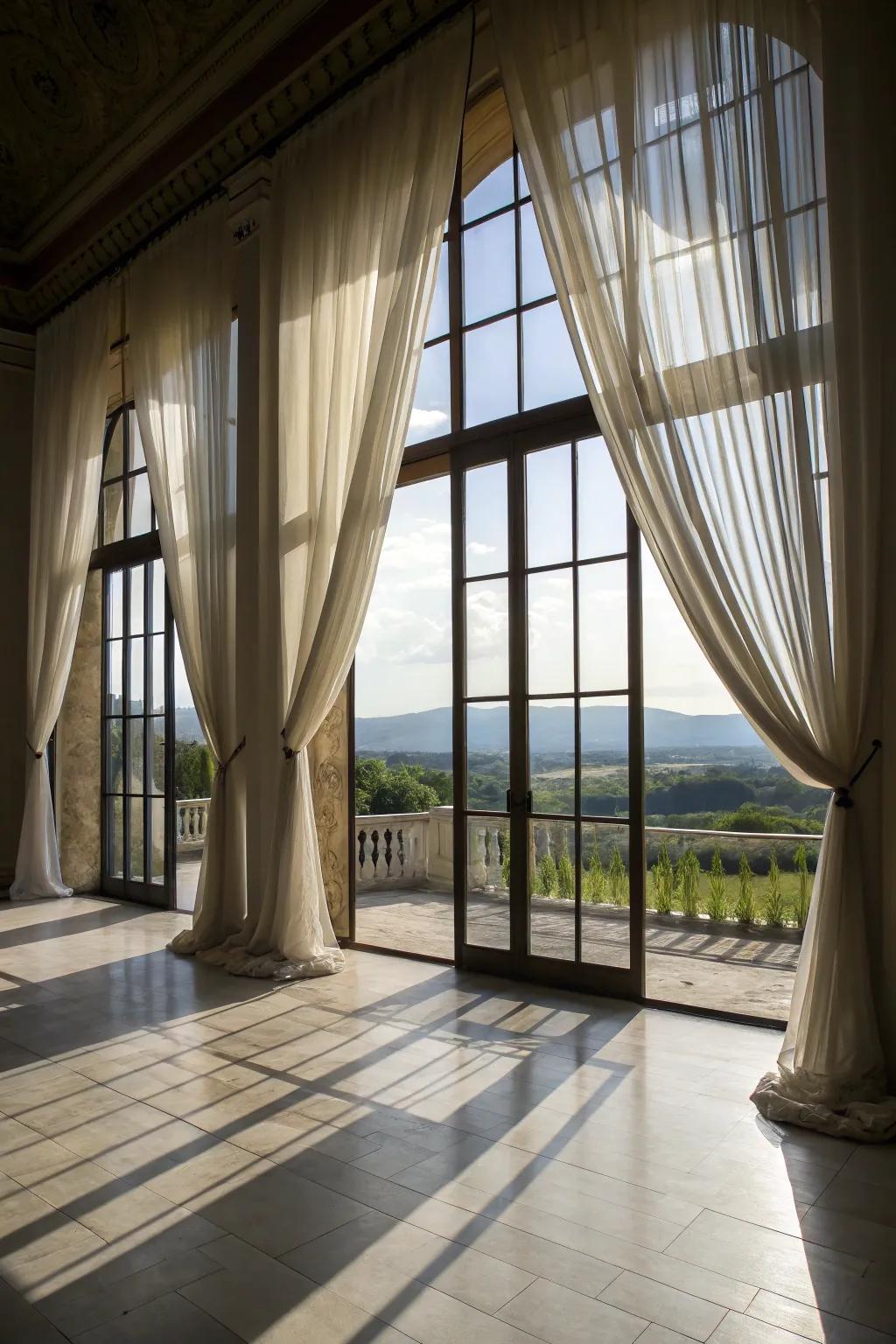 Floor-to-ceiling curtains for a dramatic effect.