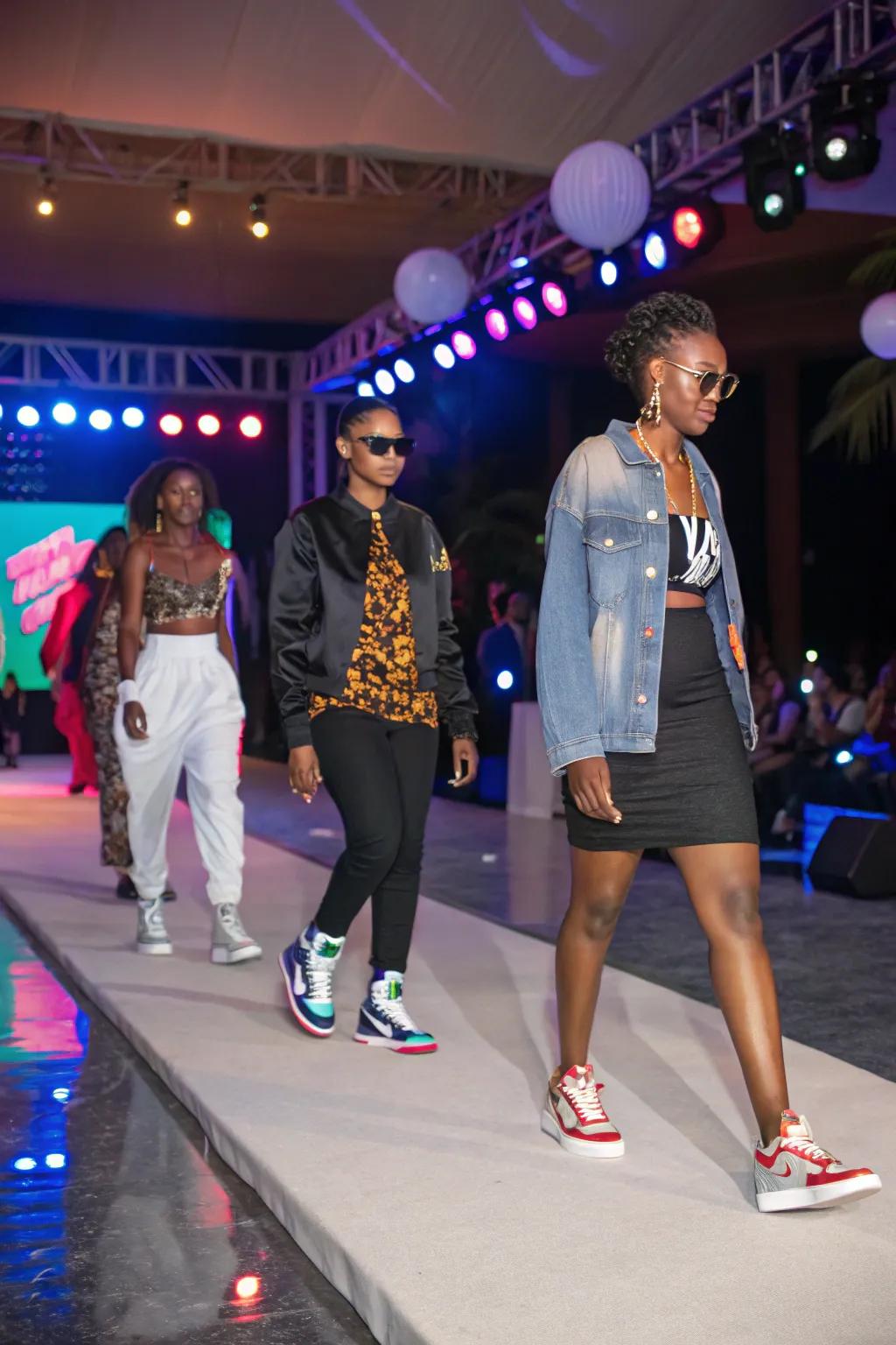 Guests showcasing their unique sneaker styles in a fashion show.