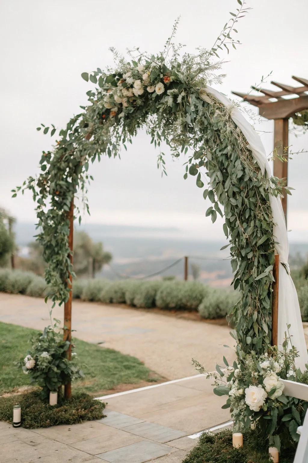 A lush eucalyptus arch that adds elegance to any garden wedding.