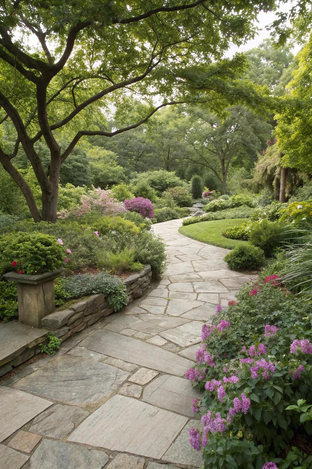 A stone patio providing a relaxing space in a landscaped garden.