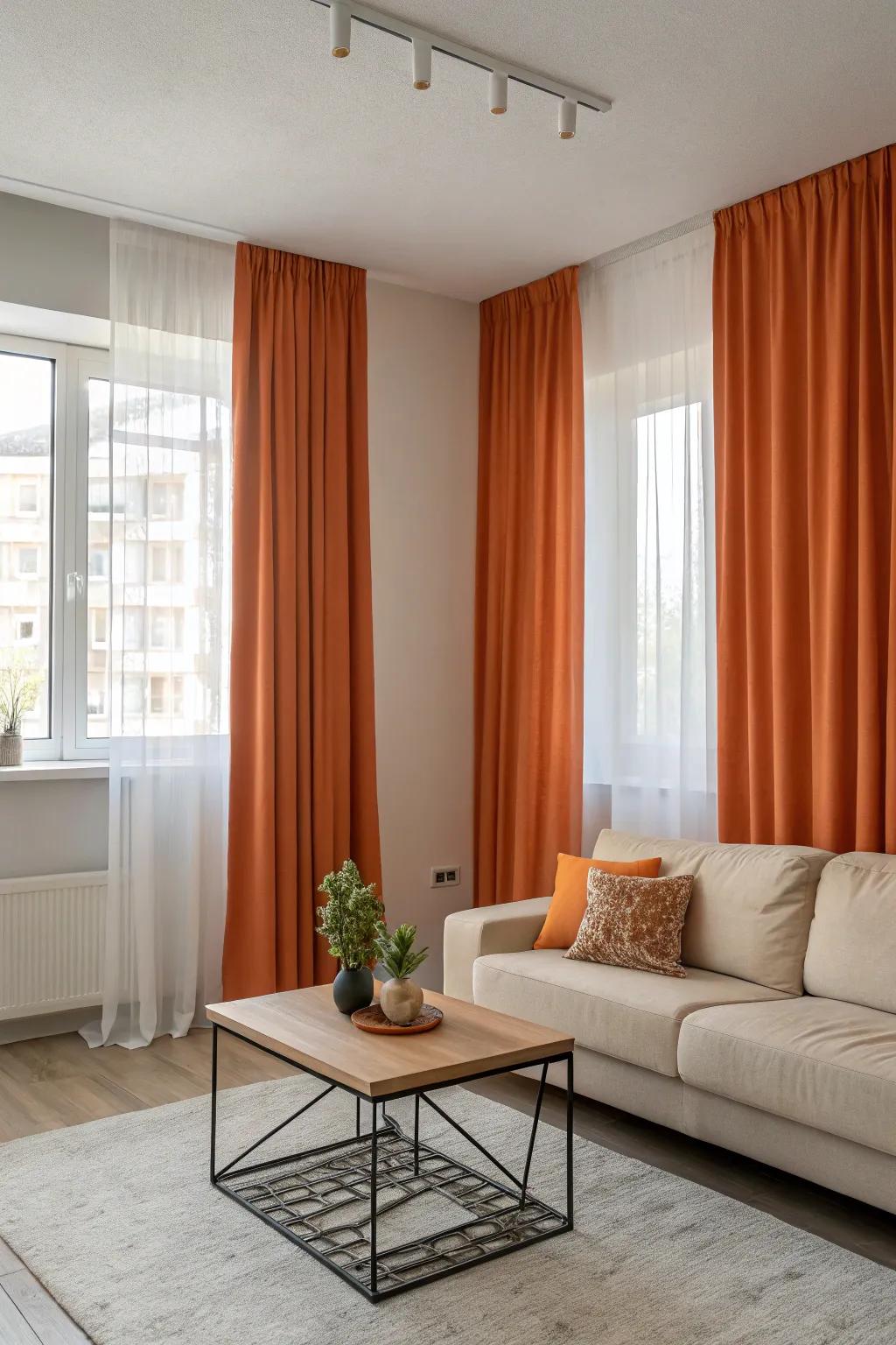 Minimalist style with solid orange curtains as a color accent.