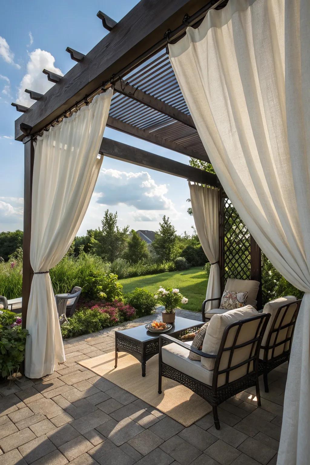 Outdoor curtains create a private and comfortable space.