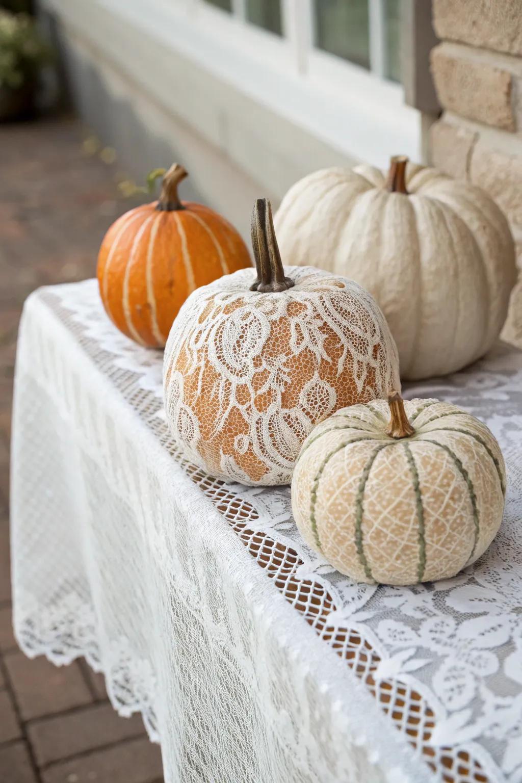 Introduce a touch of elegance with lace-decorated pumpkins.