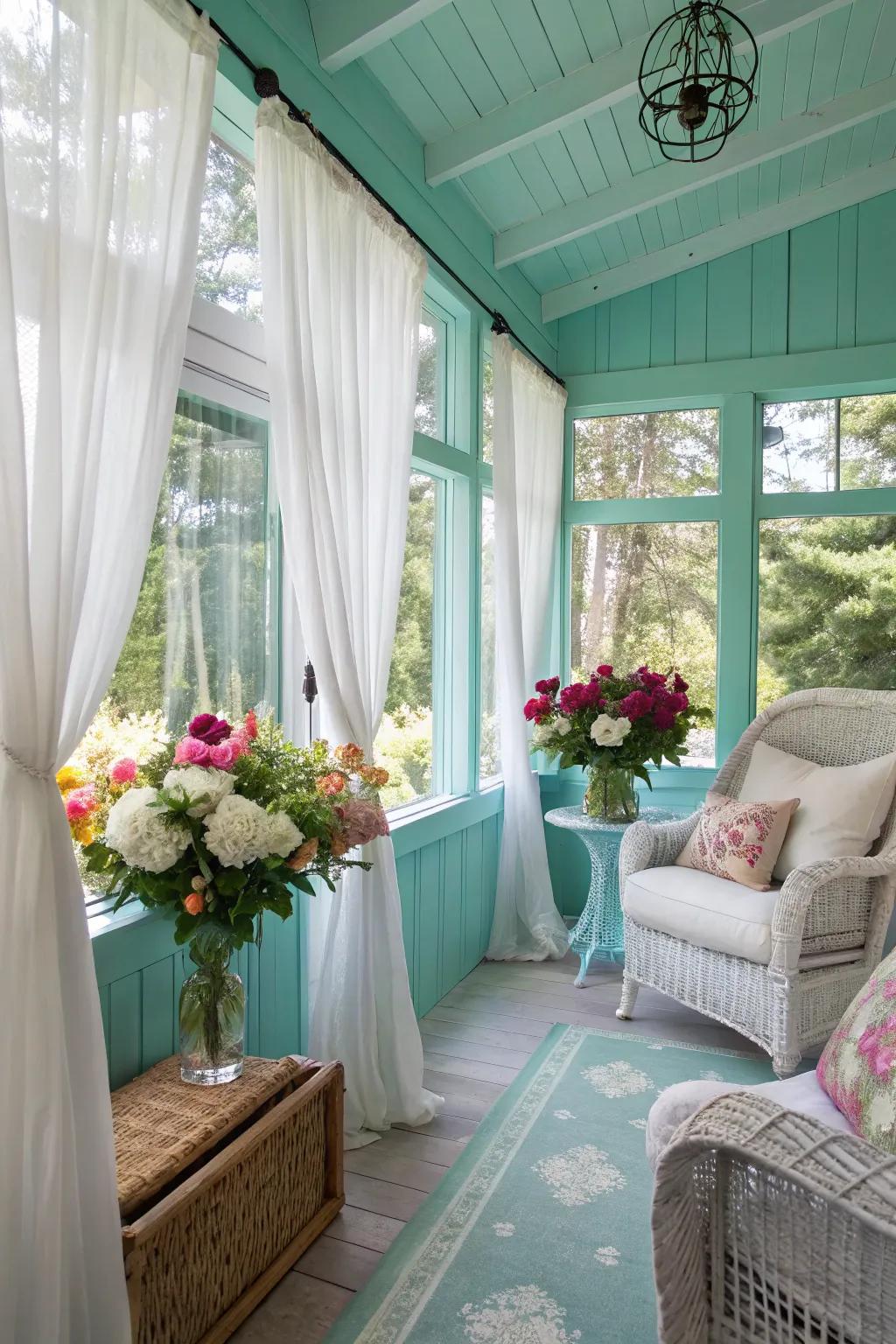 Sunroom with light turquoise walls, offering a breezy and calming ambiance.