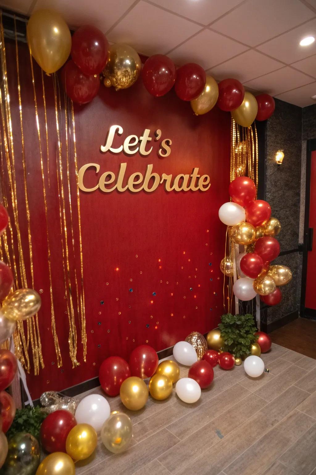 A thematic backdrop with gold lettering adds elegance to the party.