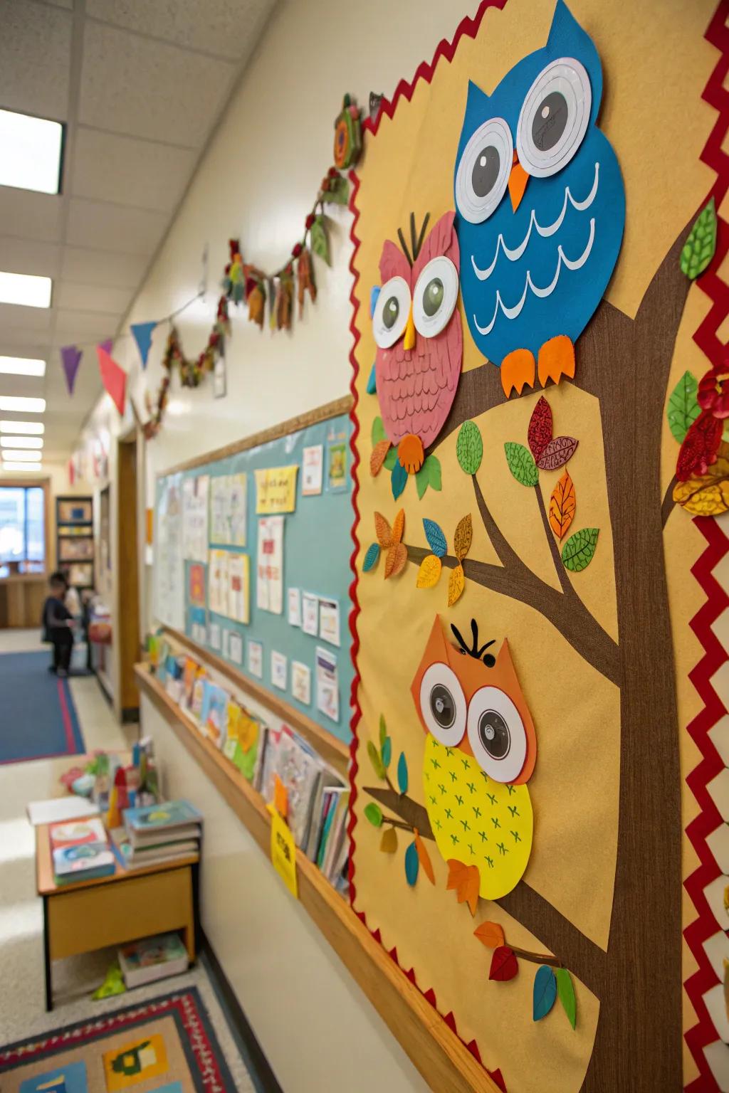 A whimsical owl-themed preschool bulletin board with interactive elements.