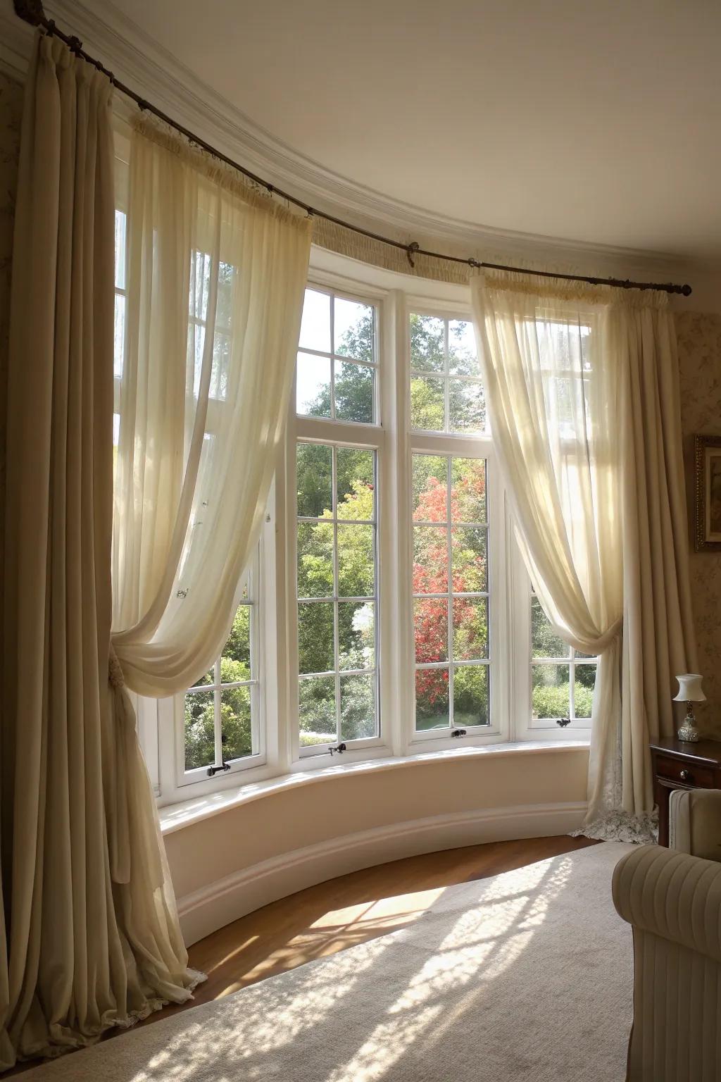 Sheer curtains enhancing the natural light of a curved bay window.