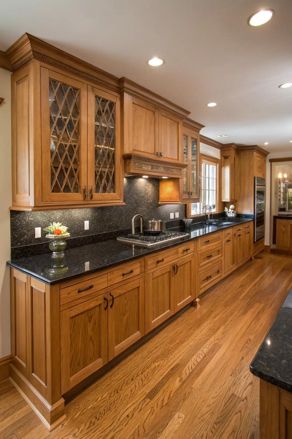 Dark countertops add an elegant contrast to oak cabinetry.