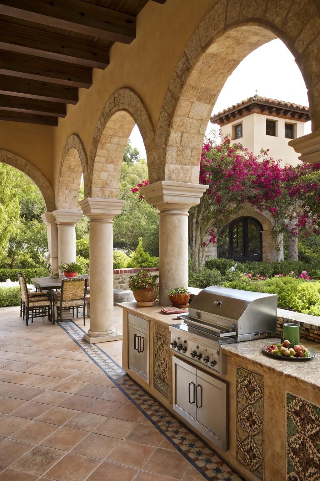 Elegant arches and columns lend a classic Spanish charm to this outdoor kitchen.