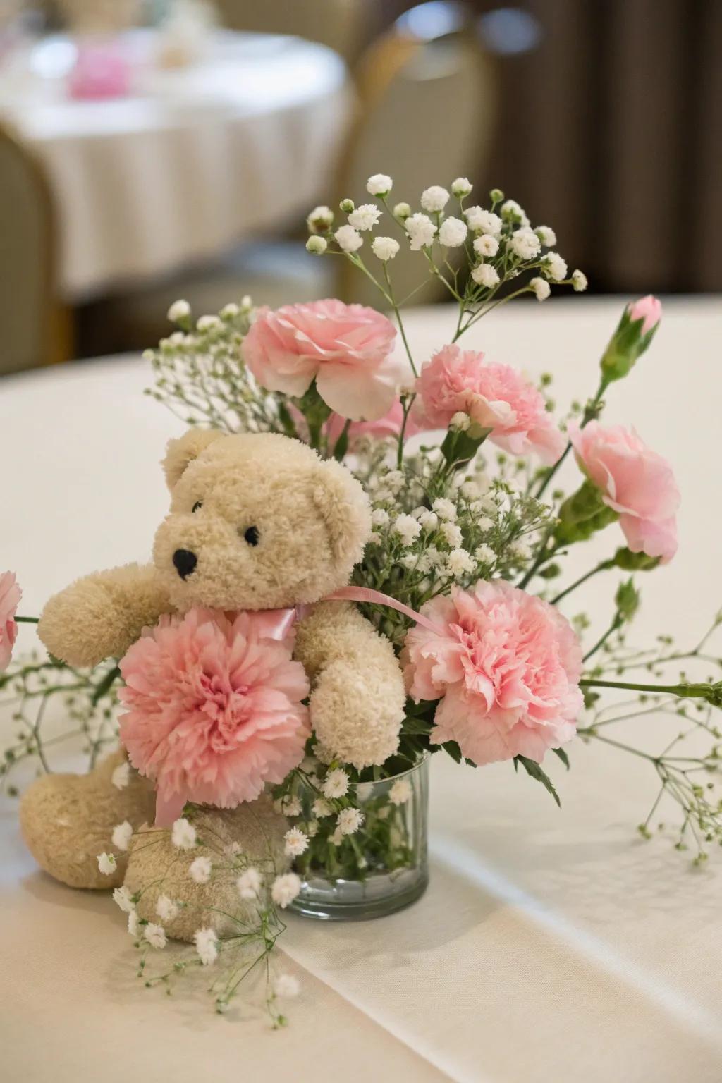 Adorable teddy bear centerpiece with delicate florals.