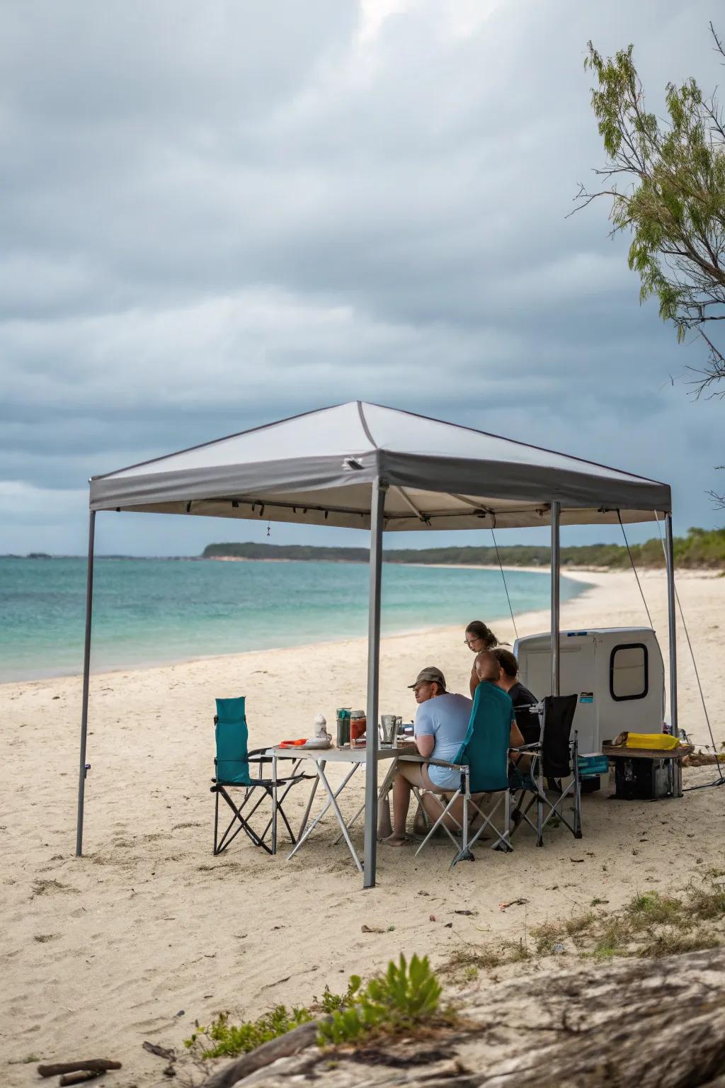 Portable awnings provide expansive shade for beach picnics.