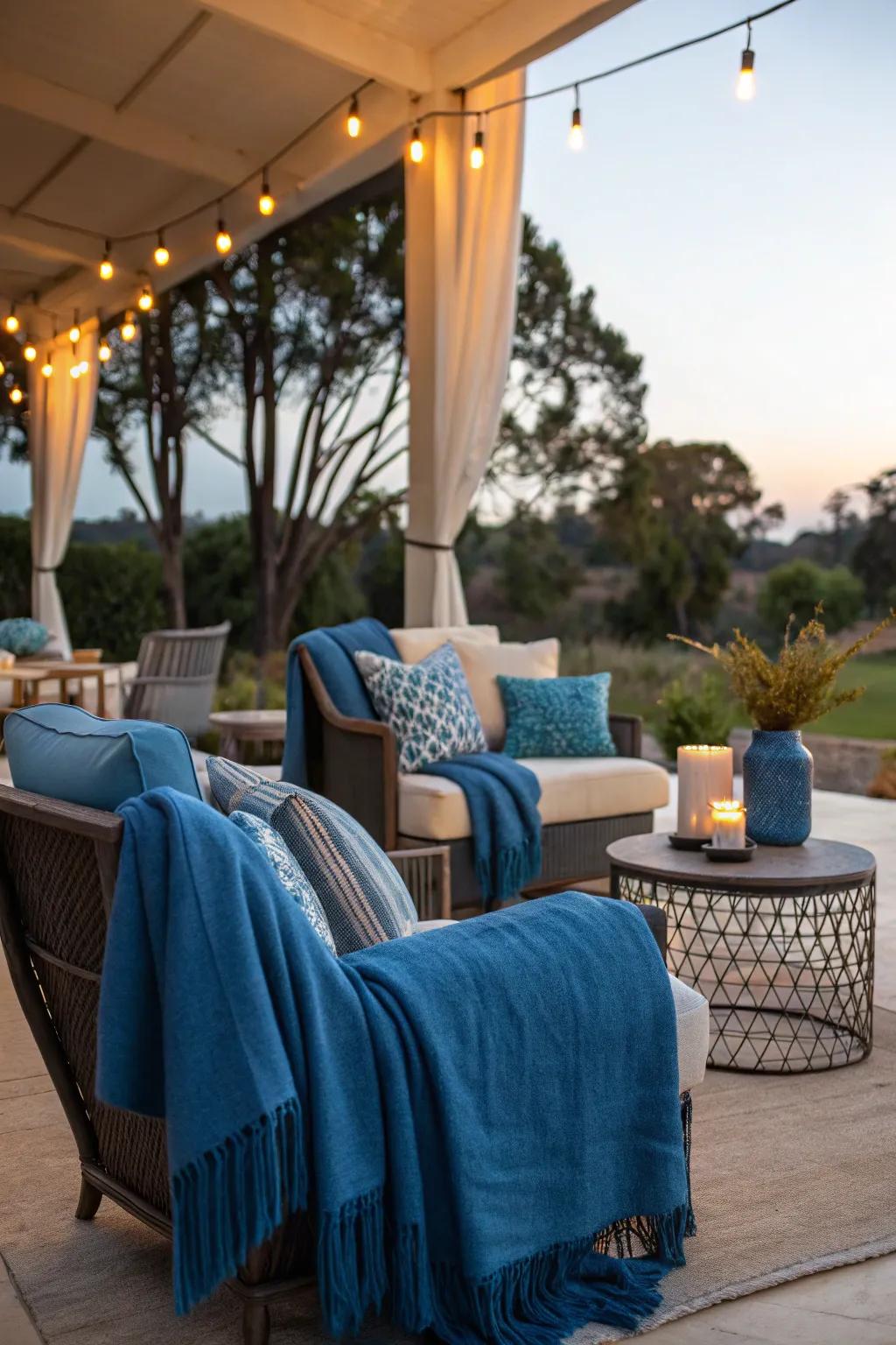 A cozy outdoor seating area with blue accents.