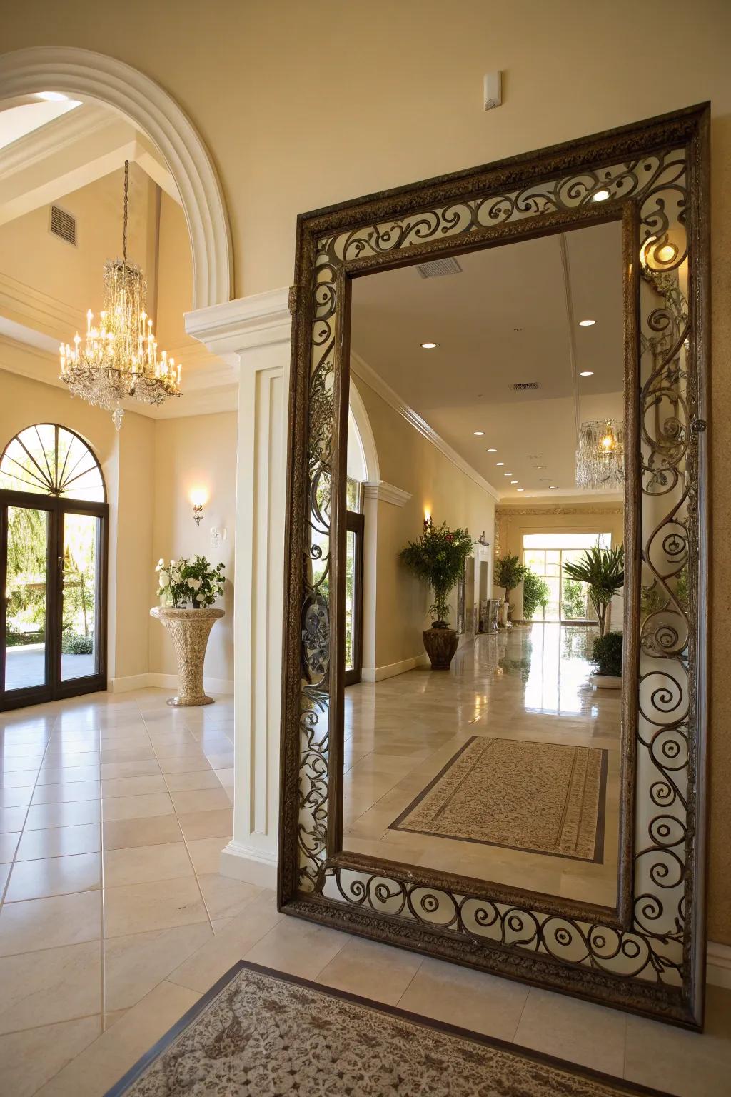 An entryway with a large decorative mirror enhancing light and creating spaciousness.