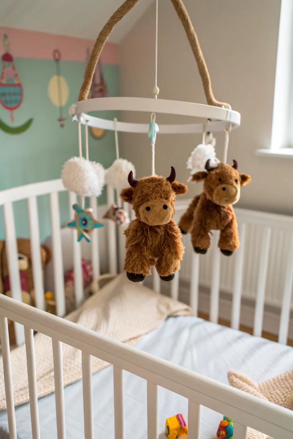 A highland cow mobile can enchant and soothe your baby.