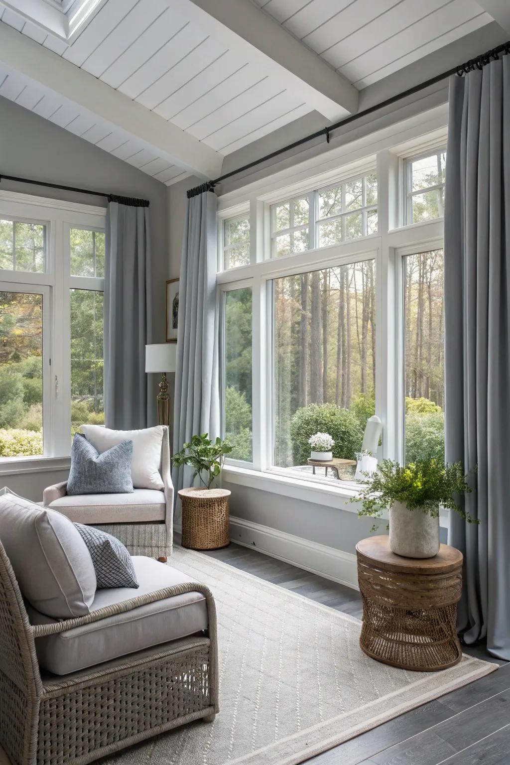 A sunroom with soft gray walls, embodying modern calm and elegance.