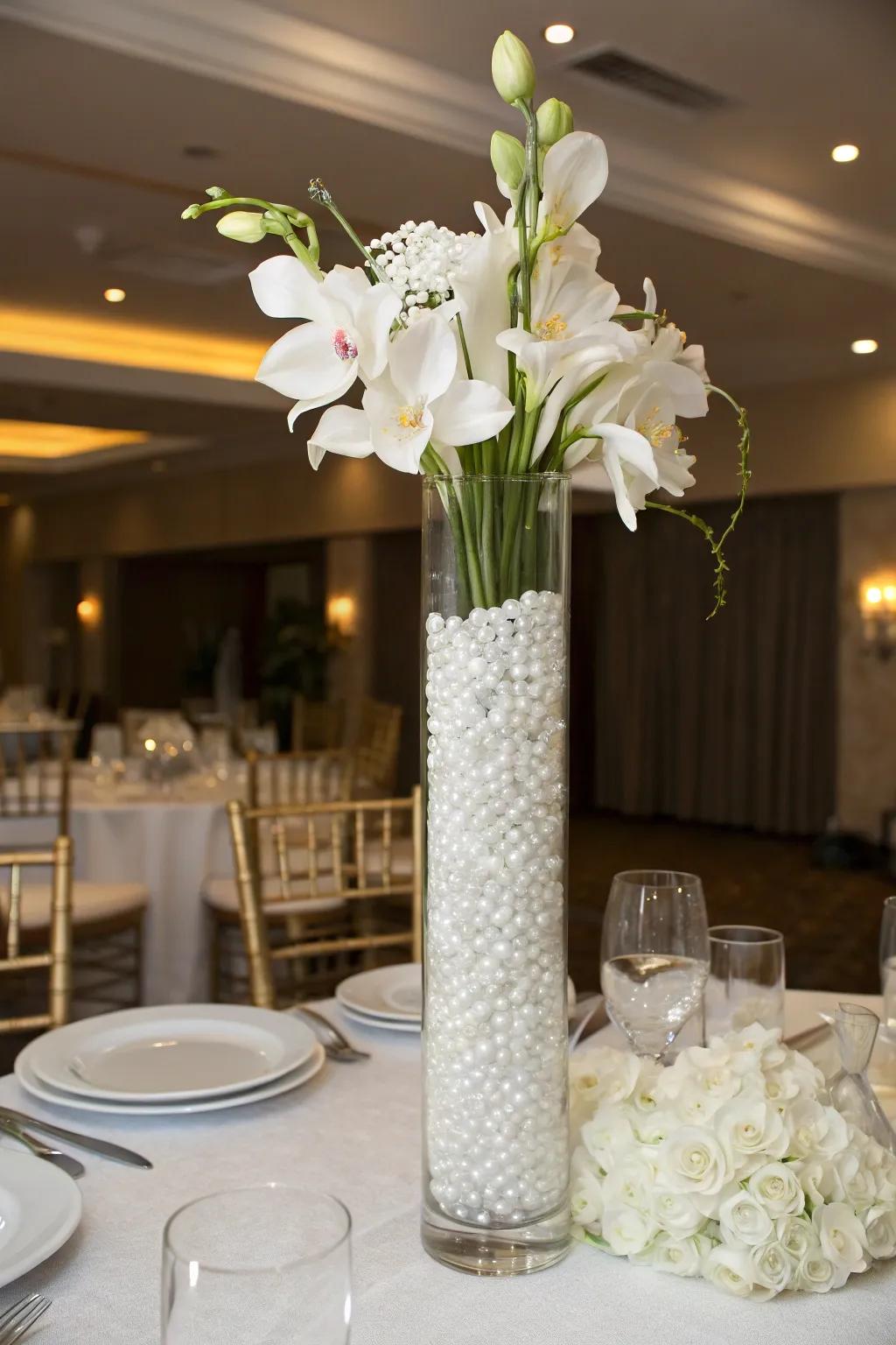 White water beads and orchids are perfect for elegant events.