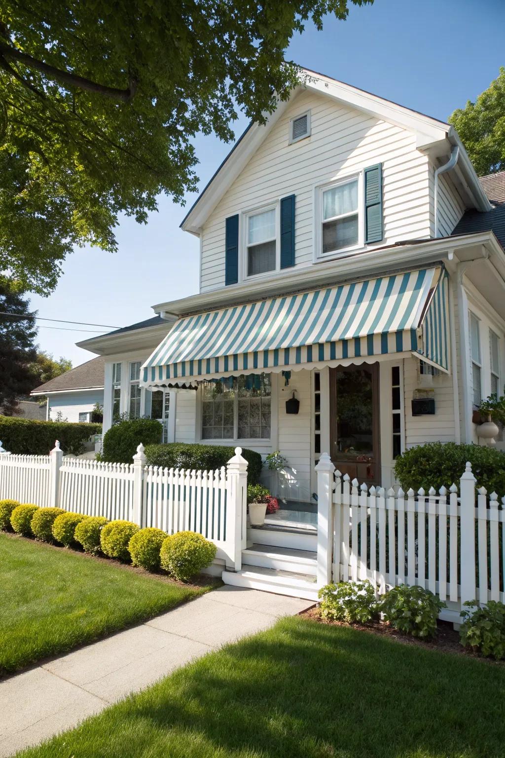 A traditional canvas awning that enhances the classic charm of the home.