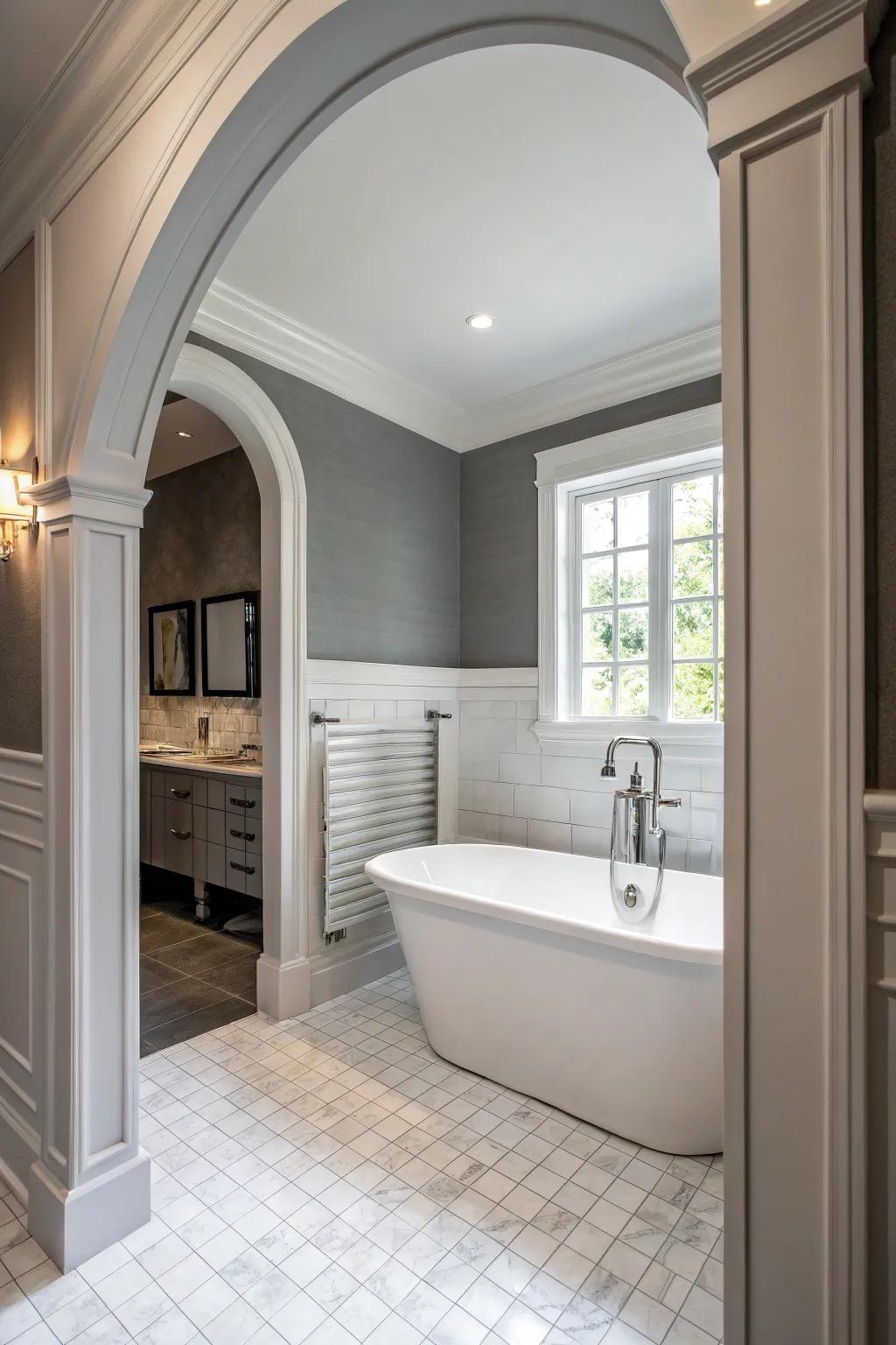 Grey walls with white elements create a classic and harmonious bathroom design.