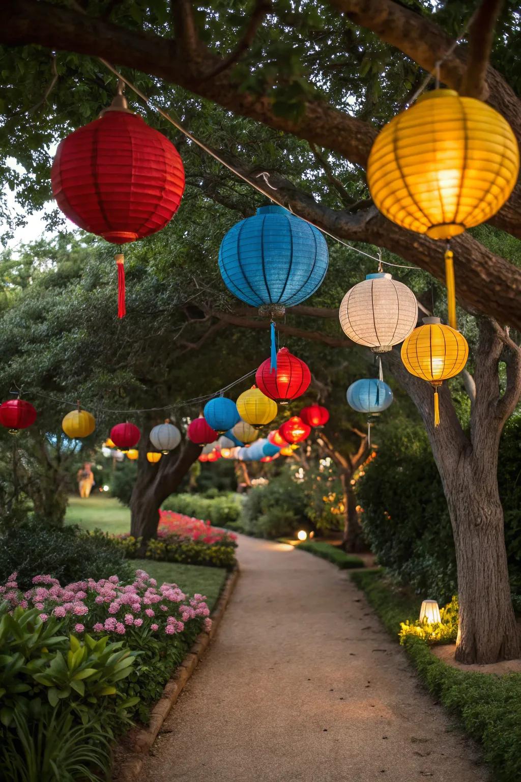 Colorful lanterns hang from trees, adding vibrant charm to the party.