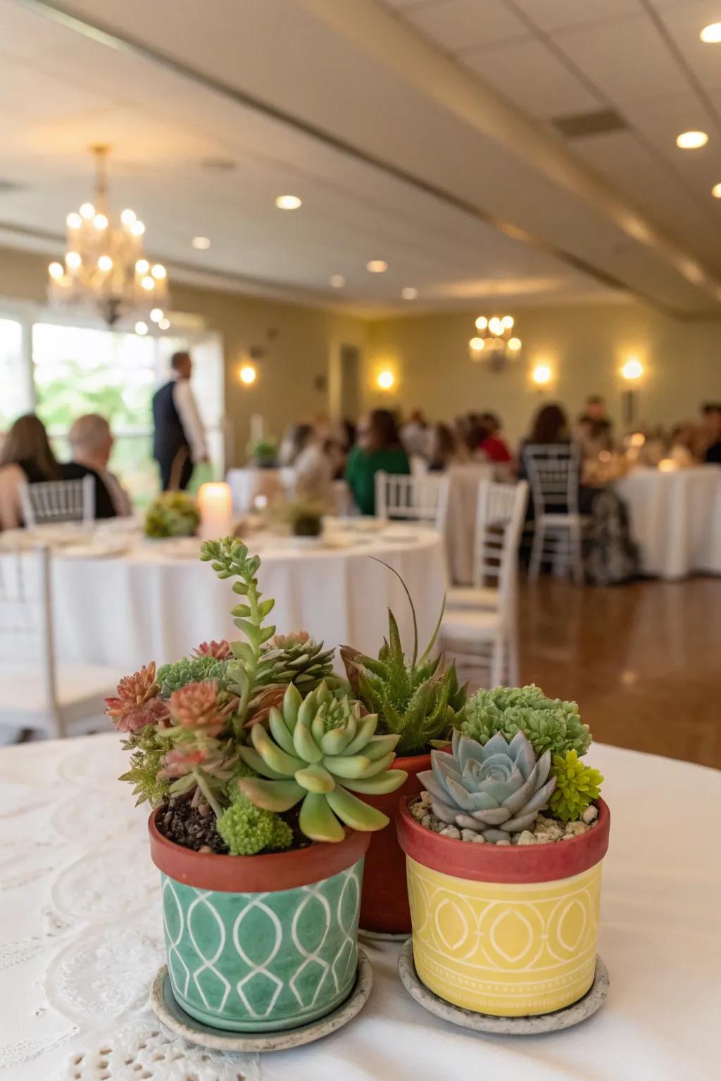 Eco-friendly and elegant: potted plants as centerpieces.