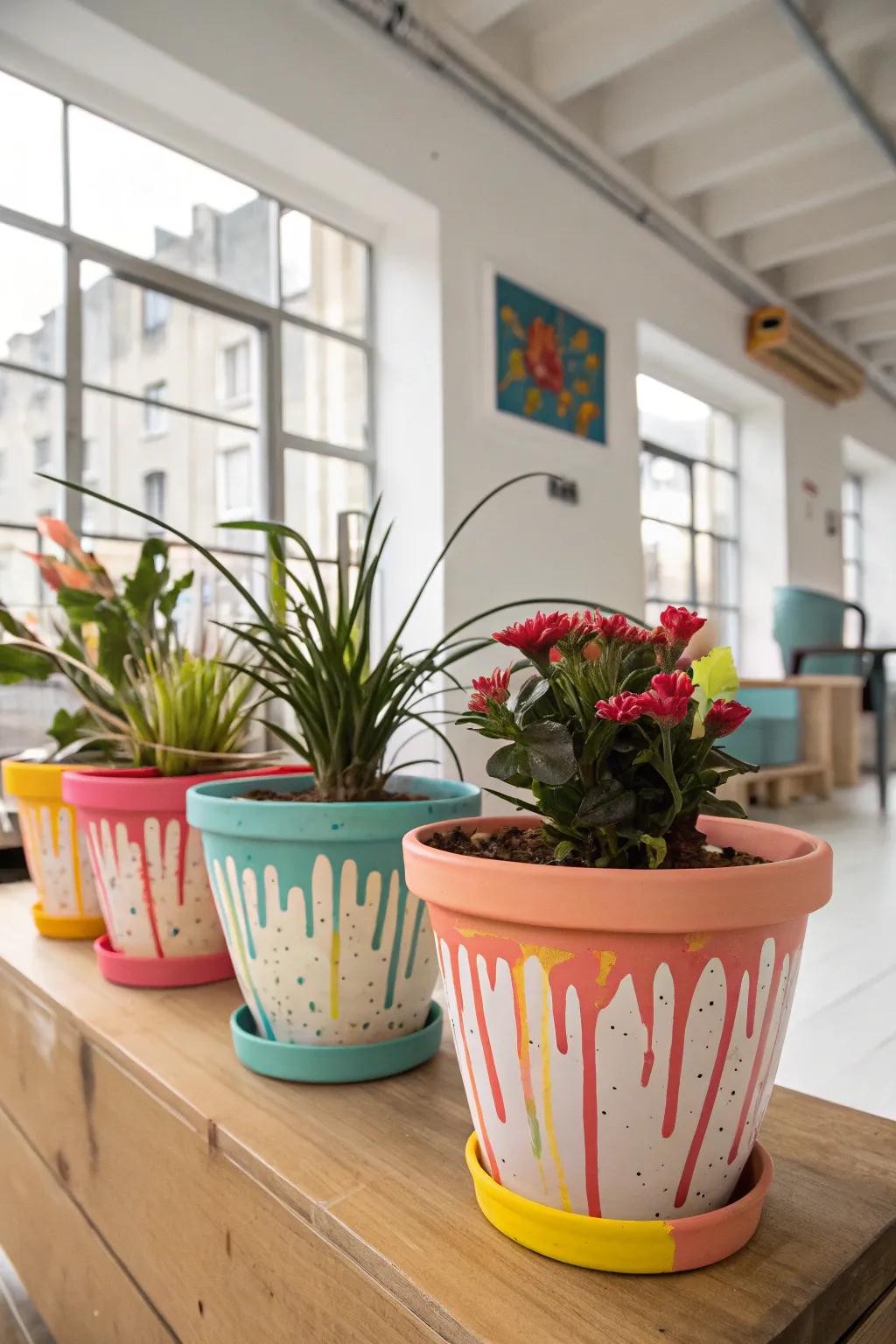 Drip-painted flower pots making a bold artistic statement.