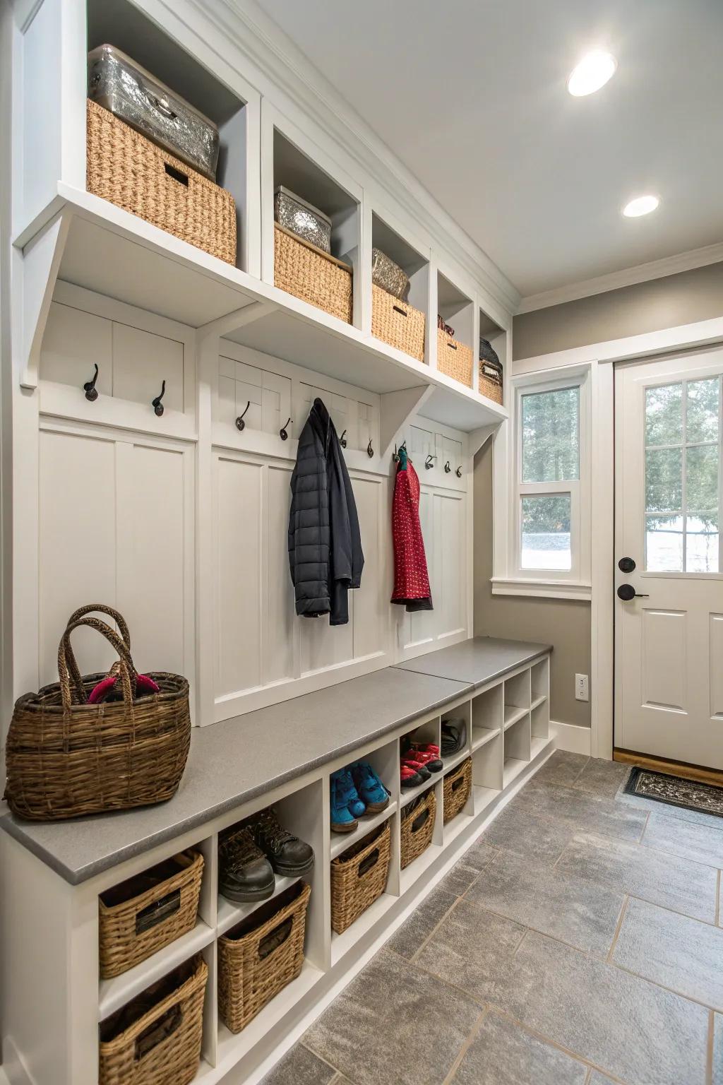 A functional mudroom with storage benches and coat hooks, helping to keep the home organized.