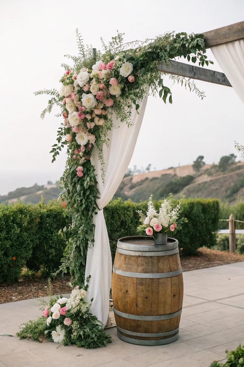 A rustic arch with wine barrel bases, ideal for vineyard weddings.