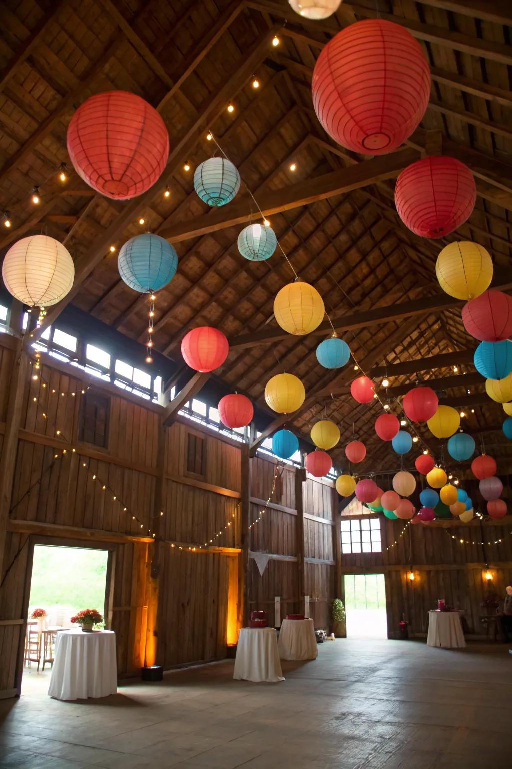 Paper lanterns bring a whimsical touch to barn settings.