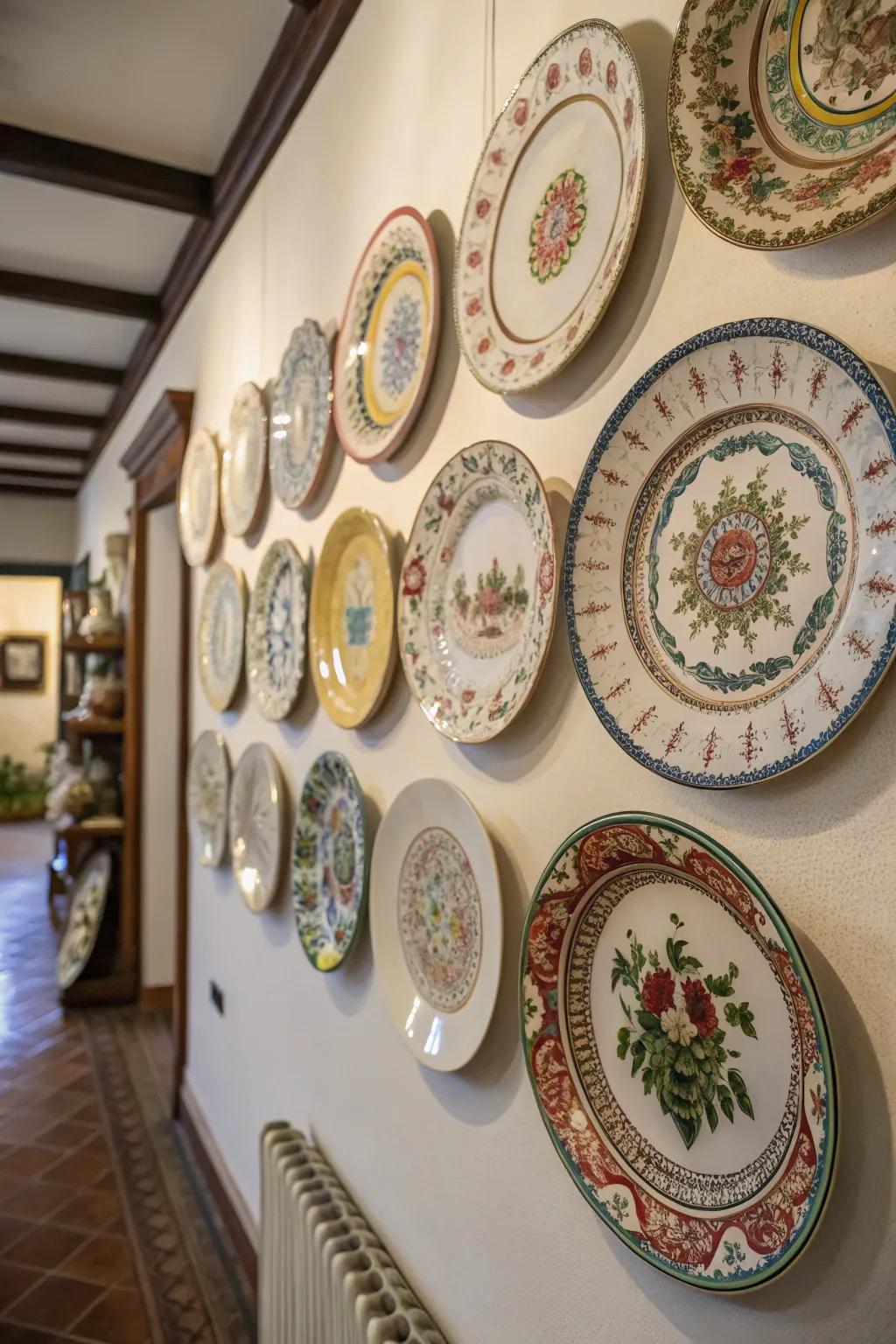 An eclectic collection of antique plates creates a charming wall display.